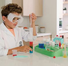 Various science-related tools are represented for experimenting with, such as test tubes, beakers, safety goggles, dyes, and a funnel. Acids And Bases, Chemistry Kit, Crystal Growing, Science Concepts, Chemistry Basics, Chemistry Set, Make A Rainbow, Chemistry Lab, Dinosaur Toys For Kids