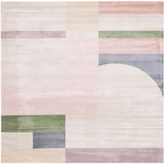 an abstract rug with various colors and shapes on the floor, including pink, green, grey