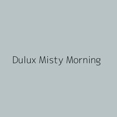 the words dulux misty morning on a gray background