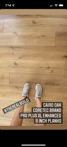 a person standing on top of a wooden floor next to a pair of feet with the words core tec brand pro plus enhanced 3 inch planks