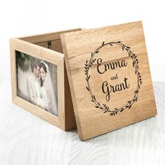 a wooden box with an engraved photo on the front and bottom that says, ama and grant