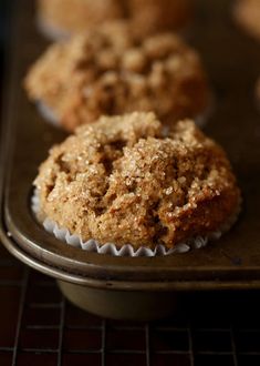 some muffins sitting on top of a baking pan