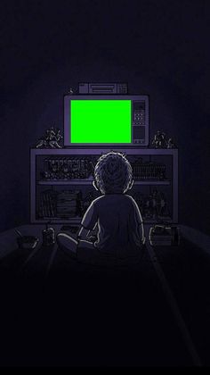 a person sitting in front of a tv with a green screen