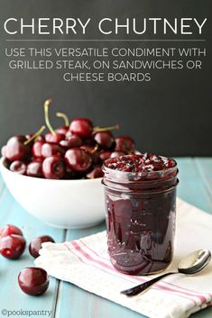 cherry chutneys in a jar with cherries on the side