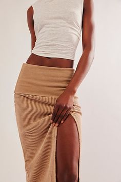 Effortless and contemporary, this essential midi skirt features a longline silhouette with exaggerated slit hem feature and wide, fold-over waistband in a textured waffle knit fabrication. * Pull-on design * Adjustable waistband * Raw-edge detailing | FP One Pari Midi Skirt at Free People in Tan, Size: L Moon Rock, Adjustable Waistband, Bottom Clothes, Waffle Knit, Raw Edge, Long A Line, Boho Outfits, Womens Bottoms, Midi Skirt