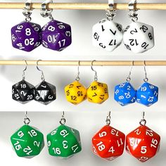 several different colored dices hanging from hooks