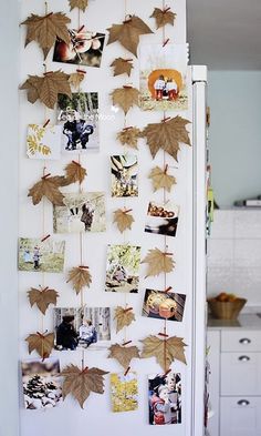 a refrigerator covered in magnets and pictures