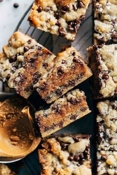 chocolate chip cookie bars on a cooling rack with a spoon