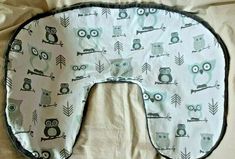 an image of a baby sleeping bag with owls on it