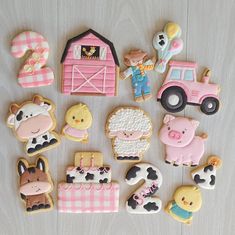 decorated cookies with farm animals and farm animals on them