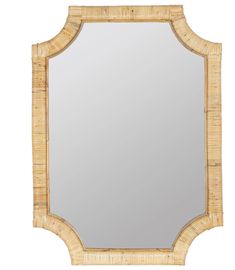 a mirror that is made out of bamboo