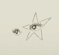 an eye and star drawn in pencil on paper