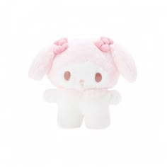 a white stuffed animal with pink ears on it's head and eyes, sitting in front of a white background