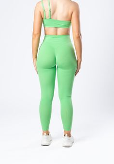 The Dip Sculptseam™ Leggings are the perfect blend of style and functionality, designed to flatter your curves and keep you comfortable all day long. These leggings feature a high-rise fit with a cleverly designed "dip" waistband that accentuates your curves. Sleek, seamless entry pockets store your essentials without adding bulk, while the no-front seam design ensures a smooth, no camel toe fit.Featuring Sculptseam™: Booty-shaping technology that contours.Create your perfect look! Pair the legg Fitted Bottoms With Contoured Waistband For Light Exercise, Functional Tight Leggings With Wide Waistband, Functional Leggings With Wide Waistband, Sporty Full-length Tights With Wide Waistband, Green Compression Tights For Yoga, Seamless Leggings For Training, Seamless Training Leggings, High Waist Green Leggings For Pilates, Functional Fitted Leggings With Seamless Construction