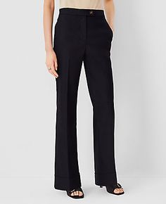 Elevate your wardrobe with the Ann Taylor Cuffed Trouser Pant in Linen Twill, a testament to timeless style and comfort. This piece is meticulously tailored to flatter your silhouette, featuring a high-rise design that sits just below the natural waist and a subtly flared leg that elegantly lengthens your legs.

- **Size**: 6 (Regular)
- **Color**: Black
- **Material**: 54% Linen, 29% Polyester, 15% Viscose, 2% Spandex
- **Fit**: Tailored and fitted
- **Length**: Full length, 31 1/2" inseam with Luxury Black Tapered Leg Work Pants, Black Tailored Tapered Leg Pants, Classic Pull-on Tapered Leg Dress Pants, Chic Tapered Leg Pull-on Dress Pants, Black Tapered Leg Pants With 4-way Stretch, Ann Taylor Petite, Women Legs, Trouser Pants, Linen Women