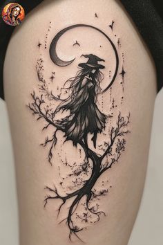 a woman's thigh with a black and white image of a witch on it