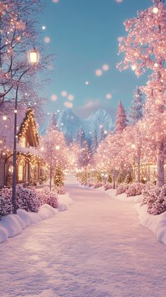 a snow covered street with christmas lights on the trees