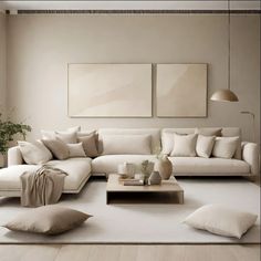 a living room filled with lots of white furniture