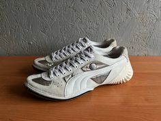 Rare Puma by Mihara Yasuhiro Designer Leather Sneakers-Shoes Color Beige Silver Size 46-30cm, UK-11, US-12 Good used condition, see photo please! Shipping worldwide: I accept combined worldwide delivery with tracking numbers. Postage: We do the shipment within 2 days. Estimated shipping time: 10-28 working days (in rare cases it takes longer). Canada 20-60 days  Look at my other items for sale. Before you want to place an order, see all additional photos, read description and check measurements. If you have any questions or problems, please, contact me! Usually my buyers are happy to deal with me, but if something is wrong and you decide to leave negative/neutral feedback, please contact me before, and we will solve this problem in the best way! I would like to be your reliable partner! Th Rare Shoes, Puma Trainers, Sneakers Athletic, Shoes Color, Shoes Trainers, Sneakers Shoes, Leather Design, Items For Sale, Mens Shoes Sneakers