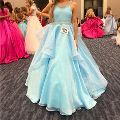 A 00 Baby Blue Pageant Dress Wore Once By A Petit 4’11 13 Year Old Made From Satin With Tulle On The Inside To Make It Have Voulue And In Incredible Condition. Blue Pageant Dress, Pageant Dress, Wearing Dress, Baby Blue, Year Old, Make It, Colorful Dresses, Color Blue, The Incredibles