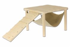 a wooden table with a slide attached to it