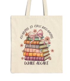 a tote bag that says reading is like reading while books are stacked on top of each other