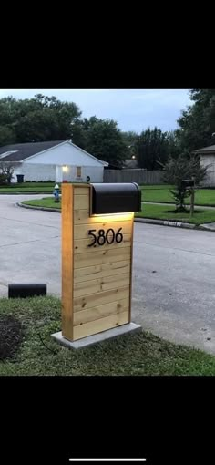 a mailbox sitting on the side of a road