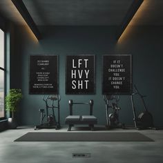 an empty gym with exercise equipment and posters