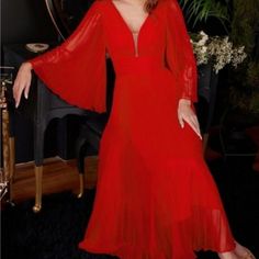 Bring The Garden To The Party In This Lovely Maxi Dress. This Chiffon Dress Is Pleated From Sleeve To Hem And Gathered At The Deep V-Neckline And Waist. An Open Mid Back Has A Center Back Zipper Closure. Graceful Full Sleeves Framing A Flattering V-Neckline. Multi-Layered A-Line Silhouette Style Is Perfect For Any Occasion. Red A-line Dress For Dinner, Flowy V-neck Midi Dress For Party, Red Long Sleeve Evening Dress For Night Out, Red V-neck Midi Dress For Dinner, Red A-line Midi Dress For Party, Red Chiffon V-neck Evening Dress, Red V-neck Midi Dress For Party Season, Flowy Long Sleeve Evening Dress For Party, Red Maxi Dress For Party