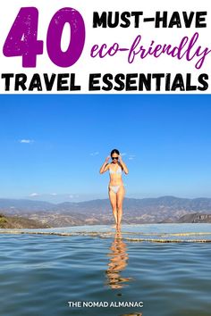 a woman standing in the water with text overlay reading 40 must - have eco - friendly travel essentials