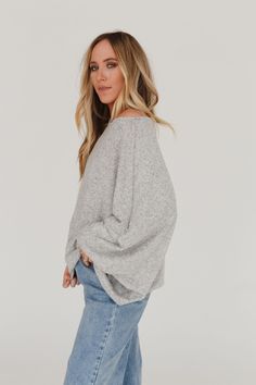 An essential, everyday sweater is the Fly With Me Batwing Sleeve Knit Sweater - the perfect silhouette to add a boho pop to any bottoms! This will become your new wardrobe staple because it features: Cozy, stretch knit fabric Relaxed and loose fit Batwing long sleeves Boat neckline An everyday boho outfit pair with: Seamless Layering Tank, Kick The Dust Up Flare, Kasia Layered Necklace *Due to lighting and differences in monitors, actual colors may vary slightly from what appears online. Model i Oversized Knit Sweater For Loungewear, Oversized Cozy Knit Top For Layering, Cozy Oversized Knit Top For Layering, Trendy Stretch Sweater With Soft Texture, Trendy Knit Top For Fall Layering, Stretch Sweater For Everyday In Fall, Stretch Sweater For Everyday Fall Wear, Versatile Winter Knit Top, Cozy Relaxed Fit Knit Top For Winter