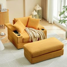 a yellow chair and ottoman in a living room