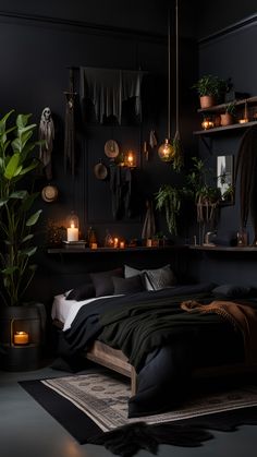 a dark bedroom with plants and candles