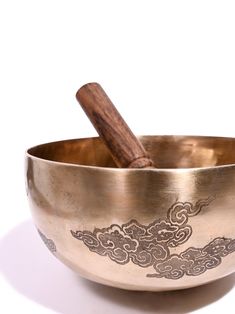 This beautiful Tibetan singing bowl is hand hammered from seven metals using traditional pounding techniques to produce its characteristic look and beautiful, multiple-harmonic sound. This stunning item has an intricate design featuring beautifully etched sky patterns, resulting in a truly unique and eye-catching appearance. Use this bowl to meditate, alter your mood, or deepen your mindfulness practice. Comes with a wooden mallet. Handmade in Nepal. Chakra Bowl, Wooden Mallet, Tea Supplies, Divination Cards, Drum Accessories, Tibetan Singing Bowls, Singing Bowl, Mindfulness Practice, Singing Bowls