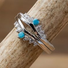 What's better than having too much bling?! Our Turquoise & CZ Wishbone Stacker Set highlights a unique, country chic style. This set is the perfect touch to pair beautifully with a ring of your own, or even with majority of our popular women's designs! ABOUT THIS RING Metal: 925 Sterling Silver, Rhodium Plating Stones: Turquoise, Cubic Zirconia IN A RUSH This product can be expedited for an extra $12. Select expedited order at checkout. QUESTIONS ABOUT SIZING Go to our Ring Sizing Guide for Chevron Wedding Ring, Stone Stacking, Antler Ring, Turquoise Rings, Ring Metal, Genuine Turquoise, Unique Engagement, Engagement Jewelry, Country Chic