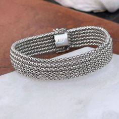 Estate/ vintage 14K white gold soft mesh bangle bracelet. Very heavy + substantial piece. Lays nicely on the wrist + layered with more bracelets! Length: 8” Shown on a 6" wrist Width: 14mm Weight: 18.20 grams Push-in style clasp with 2 figure 8 security latch Stamped 14K Excellent condition Panther Jewelry, Saint Jewelry, Chunky Bracelet, Chunky Bracelets, White Gold Bracelet, Back Jewelry, White Gold Necklaces, Figure 8, White Gold Earrings