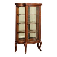 a wooden display case with glass doors on the top and bottom shelves, in an antique style