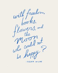 the quote is written in blue ink on a white background with an image of flowers