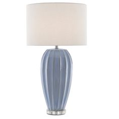 a blue lamp with a white shade on it