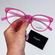 Saint Laurent Sl589 004 Eyeglasses Transparent Fuchsia Pink Oval Women Brand: Saint Laurent Model: Sl589 Color Code: 004 Gender: Women Year: 2023 Frame Color: Transparent Fuchsia Pink Lens Color: Demo Frame Shape: Oval Frame Style: Full-Rim Frame Material: Recycled Acetate Size: 52x19x145 Made In Italy. Full Retail Package With All Accessories: Case, Cloth And All Paperwork. 100% Authentic! Saint Laurent Fashion, Pink Eyeglasses, Tortoise Glasses, Black Cat Eyes, Glasses Brands, Pink Frames, Heart Sunglasses, Saint Laurent Paris, Eyewear Womens