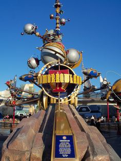 the entrance to tomorrowland at disneyland world