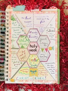 an open notebook with the words holly week written on it and surrounded by red flowers