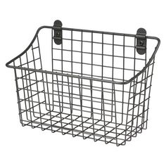 a metal basket with two hooks on it