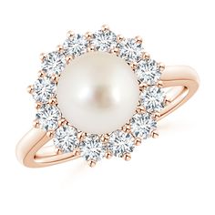 Classic and breathtaking, this is a Princess Diana inspired pearl ring set in 14k rose gold. The South Sea cultured pearl is surrounded by a floral halo of prong-set round diamonds. Girls Ring, Cultured Pearl Ring, Gold For Women, Floral Halo, Freshwater Pearl Ring, June Birthstone Jewelry, Diamond Halo Ring, Gift For Her Birthday, June Birthstone