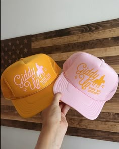 Gold or light pink high crown foam snap back trucker hat detailed with light pink or mustard yellow graphic Adjustable 5-panel Trucker Hat For Rodeo, Adjustable Snapback Trucker Hat For Rodeo, Adjustable Trucker Hat For Rodeo, Spring Trucker Hat, Retro Trucker Hat, Beach Trucker Hat, Cute Trucker Hats, Trucker Hat Bar, Hat Design Ideas