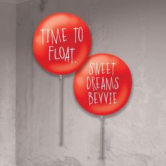 two red balloons with the words time to float and sweet dreams bewive written on them