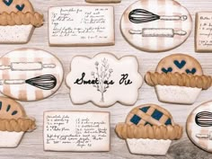 some cookies are decorated with blue and white designs