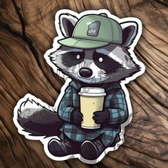 a raccoon wearing a hat and holding a coffee cup on top of a wooden table