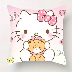 a hello kitty pillow with a teddy bear on it