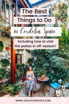 Female in a floral dress in a patio located in Cordoba, Spain full of green plants and flowers Travel Ireland Tips, Best Beaches To Visit, Cordoba Spain, Spain Photography, Travel Winter